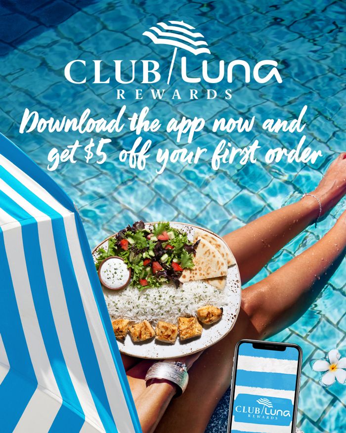 Mobile image of woman eating mediterranean food near the pool to promote Club Luna Rewards